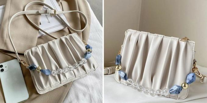 Lille taske med et håndtag lavet af sten og perler