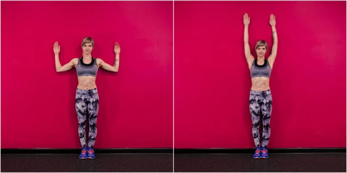 Sådan forstørres dine bryster med træning: løft dine arme ved siden af ​​en mur